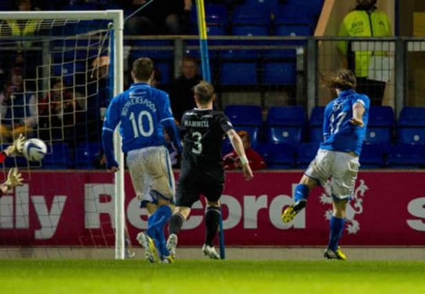 Stevie May slots the ball home to give St Johnstone a 1-0 lead. Picture: SNS