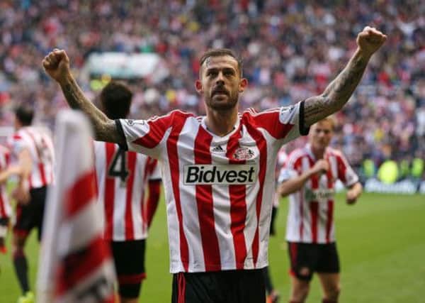 Steven Fletcher celebrates Fabio Borini's winner in yesterday's derby. Picture: Getty