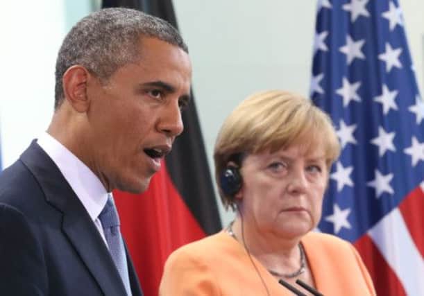 It is claimed that Mr Obama wanted to 'know everything' about the powerful Merkel. Picture: AP
