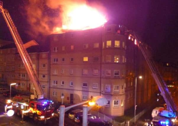 Firefighters tackle the huge blaze in Roslea Drive in Dennistoun, Glasgow. Picture: Hemedia