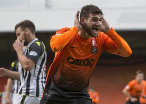 Dundee United's Nadir Ciftci approves of his Premiership player of the week award. Picture: PA