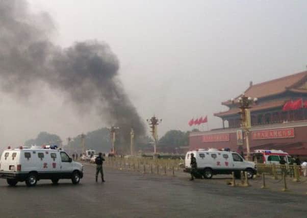 Five people were killed when an SUV crashed into a crowd in Beijing's Tiananmen Square and burst into flames. Picture: Getty