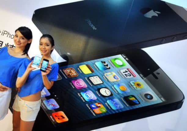 Sales of Apples flagship iPhones and iPads have rocketed. Picture: Getty