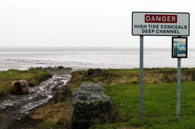 Dramatic rescue sees youngster pulled to safety from Solway Firth. Picture: AP