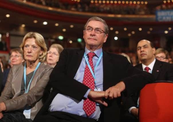 Lord Ashcroft, centre, said a poll he had funded showed one in six Scots is sympathetic to Mr Camerons politics. Picture: Getty