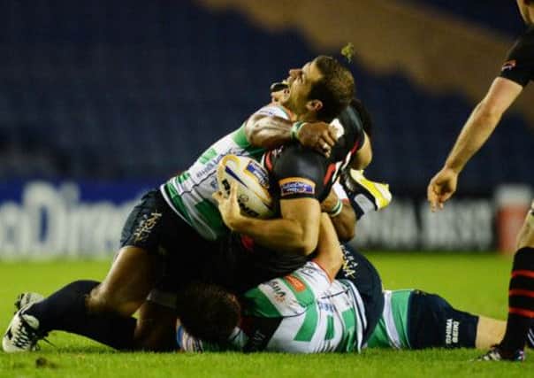 This challenge on Tim Visser resulted in the winger being stretchered off against Treviso. Picture: SNS