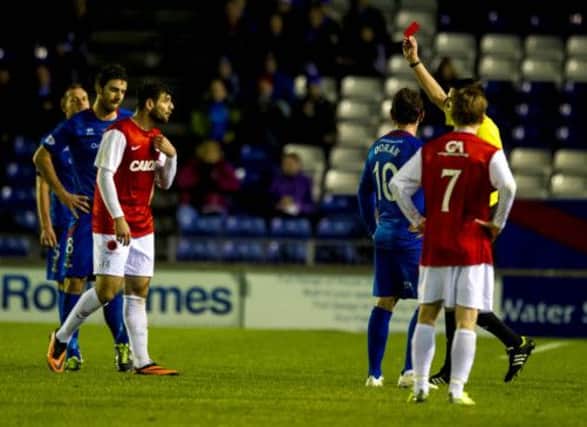 Seeing red: Dundee Utd's Nadir Ciftci was sent off. Picture: SNS