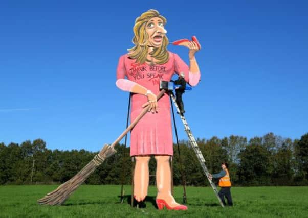 Artist Frank Shepherd puts the final touches to his Katie Hopkins effigy. Picture: PA
