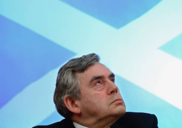 Gordon Brown told a panel discussion that he was an ex-politician - despite still being an MP. Picture: Getty