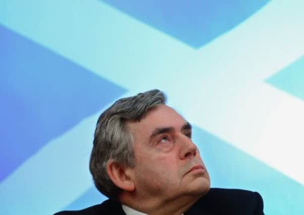 Gordon Brown told a panel discussion that he was an ex-politician - despite still being an MP. Picture: Getty