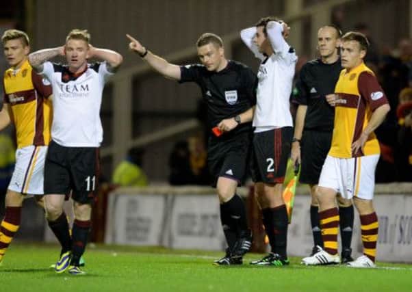 Aberdeen's Joe Shaughnessy (3rd from right) was shown the red card. Picture: SNS