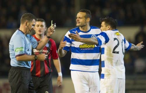 John McKendrick books Nacho Novo (right) prior to the free-kick that lead to St Johnstone's winning goal. Picture: SNS
