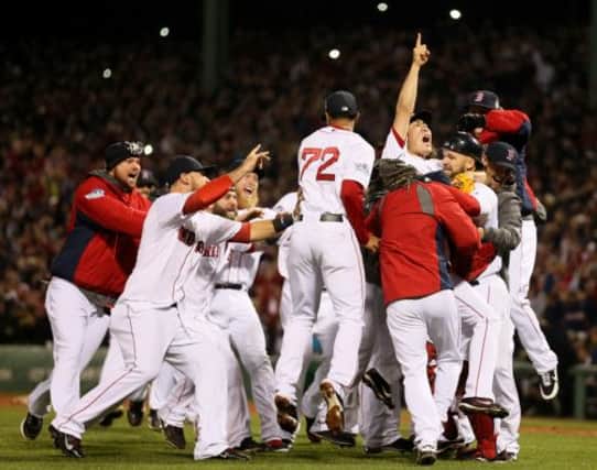 The Boston Red Sox celebrate after defeating the St Louis Cardinals to win the World Series. Picture: Getty