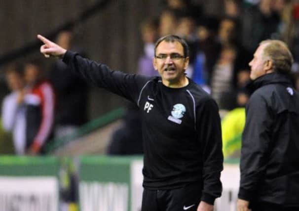 Hibs manager Pat Fenlon fires instructions to his team during Wednesday's defeat by Hearts. Picture: Ian Rutherford