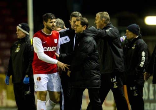 Dundee United's Nadir Ciftci leaves the field after being dismissed against Inverness. Picture: SNS