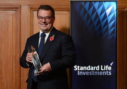 Keith Skeoch with the SFEs award last night. Picture: Neil Hanna