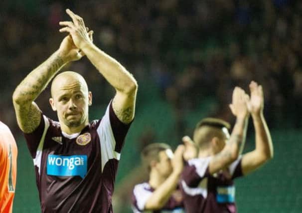 Jamie Hamill applauds the Hearts fans following victory over Hibs at Easter Road. Picture: SNS