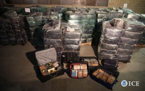 This image released by the US Immigration and Customs Enforcement (ICE), seized drugs are seen on October 31, 2013. The drugs were taken from a tunnel linking warehouses in San Diego's Otay Mesa industrial park and Tijuana, Mexico. The tunnel, equipped with electricity, ventilation and rail tracks, was shut down Wednesday night. Three people were arrested, and authorities seized more than eight tons of marijuana and 325 pounds of cocaine, marking the first time cocaine has recovered in connection with a local drug tunnel, ICE.    = RESTRICTED TO EDITORIAL USE - MANDATORY CREDIT "AFP PHOTO / Immigration and Customs Enforcement" - NO MARKETING NO ADVERTISING CAMPAIGNS - DISTRIBUTED AS A SERVICE TO CLIENTS  NO ARCHIVE =-/AFP/Getty Images