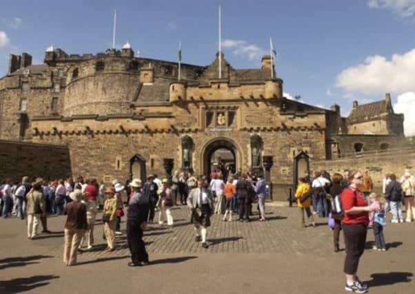 Tourists at Edinburgh Castle, which has won the UK heritage attraction of the year award for a third time. Picture: TSPL