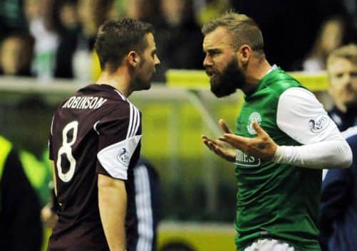 Scott Robinson and Rowan Vine square up during a League Cup clash rich in drama but low on talent. Picture: Ian Rutherford