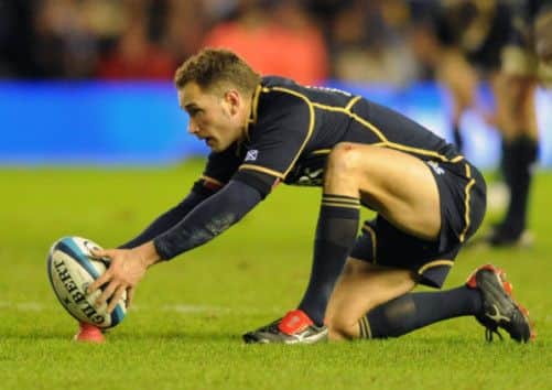 Dan Parks places a kick in one of his 67 appearances for Scotland. Picture: Ian Rutherford
