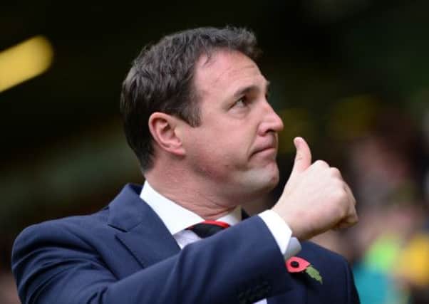 Cardiff boss Malky Mackay has had to contend with off-field turmoil ahead of tomorrows derby against Swansea. Picture: Getty