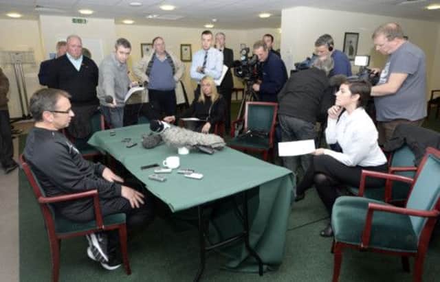 Pat Fenlon addresses the media at Easter Road yesterday afternoon after resigning as Hibernian manager. Picture: SNS Group