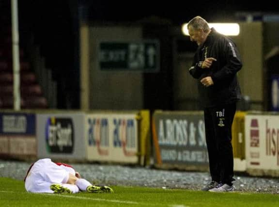 Terry Butcher (right) has words with Gary Mackay-Steven. Picture: SNS