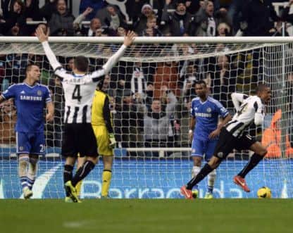 Newcastle United's Loic Remy, right, celebrates after scoring the decisive second goal. Picture: Reuters
