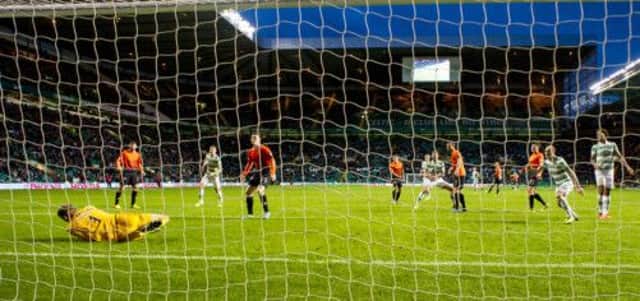 Celtic's Charlie Mulgrew scores in injury time. Picture: SNS