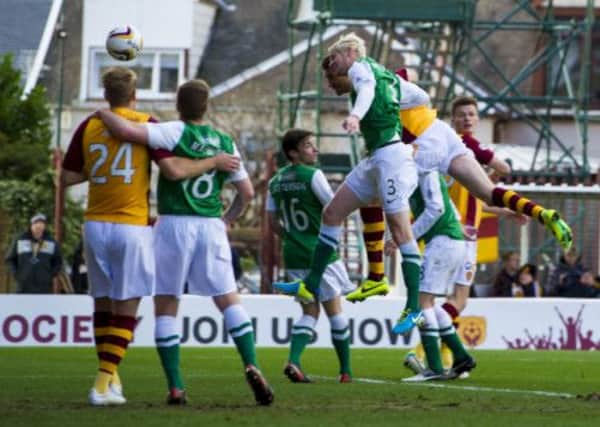 Stephen McManus bullets home a header to give Motherwell a 1-0 lead after 22 minutes. Picture: SNS