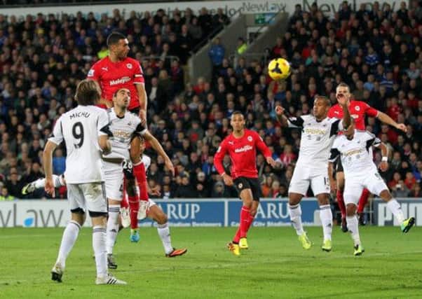 Steven Caulker rises highest to score what turned out to be the winner. Picture: PA