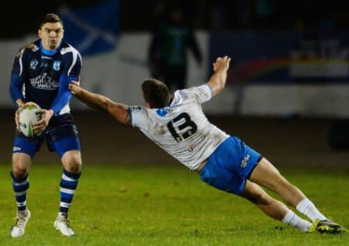 Danny Brough (Scotland) and Joel Riethmuller in action during the topsy-turvy draw. Picture: Getty