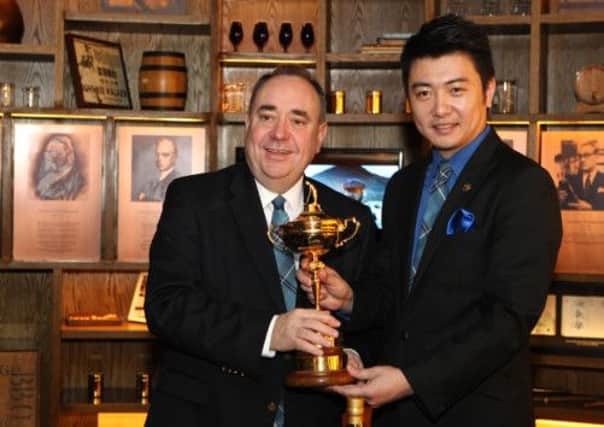 Alex Salmond with Liu Wei, Johnnie Walker Brand Ambassador for China, with the Ryder Cup. Picture: Contributed