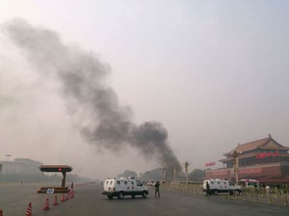 Police set up road blocks after the burning car incident. Picture: AFP