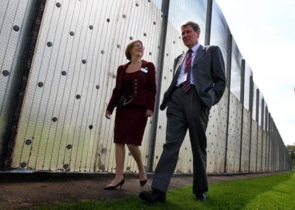 Cabinet Secretary for Justice Kenny MacAskill walks with prison governor Teresa Medhurst during a visit to  HMP Cornton Vale. Picture: PA