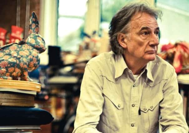Designer Sir Paul Smith, who doesn't use the internet, pictured in his office. Picture: Contributed