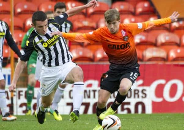 Dundee United's Ryan Gauld in action. The teenager will stay at Tannadice until 2016. Picture: SNS