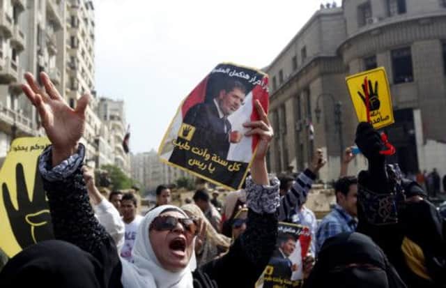 Crowds outside the hearing in Cairo. Picture: Reuters