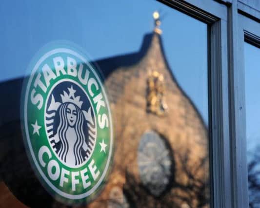 There has been widespread anger over the levels of tax which firms such as Starbucks pay in the UK. Picture: TSPL