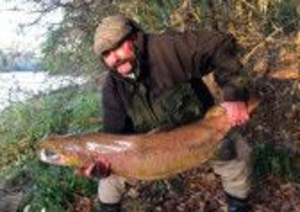 Nigel Fell with the record salmon