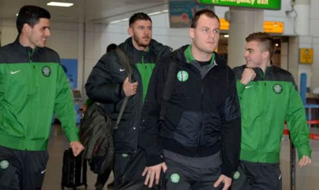 Celtic players gather at Glasgow airport this morning before boarding their flight to Amsterdam. Picture: SNS