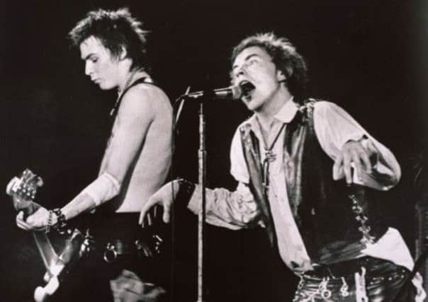 Six Vicious, left, and Johnny Rotten of the Sex Pistols perform in San Francisco, California in 1978. Picture: AP