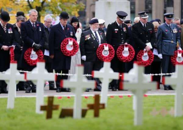 Wreaths are laid at The Service of Dedication at the Garden of Remembrance in George Square, Glasgow. Picture: PA