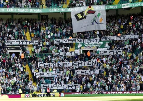 Celtic fans protest against the legislation. Picture: SNS