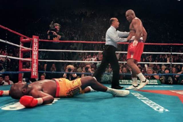 On this day in 1994, George Foreman, 46, became the oldest boxer to win a world title, knocking out Michael Moorer in Las Vegas. Picture: Getty