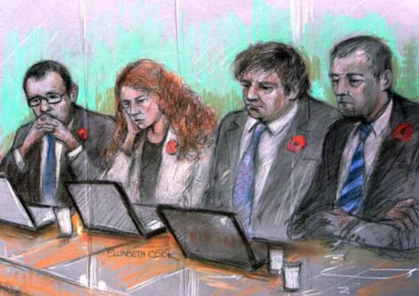 Andy Coulson, Rebekah Brooks, Charlie Brooks and Mark Hanna during the phone hacking trial at the Old Bailey, central London. Picture: PA