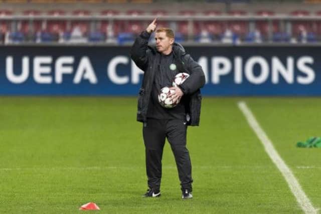 Neil Lennon leads a training session with his Celtic side in Amsterdam last night. Picture: Reuters