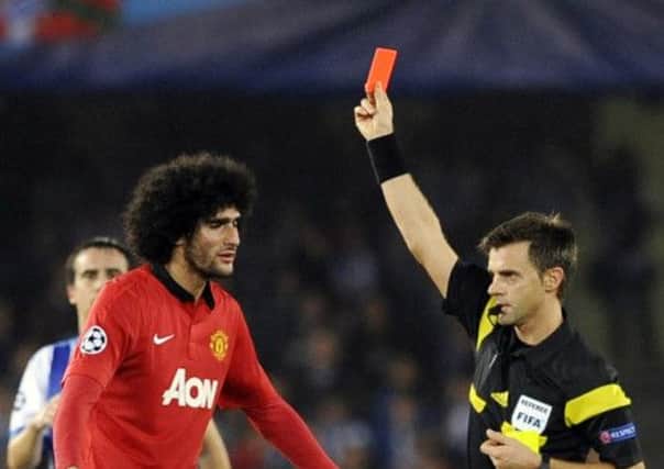 Manchester Uniteds Marouane Fellaini is sent off after picking up his second booking. Picture: AFP/Getty