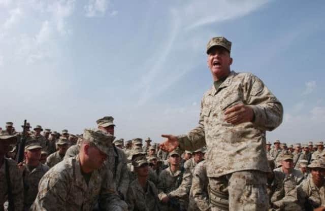 Commander Lt Gen John F Sattler delivers a speech to Marines anticipating the final offensive on insurgents in Iraq in 2004. Picture: Getty
